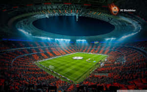 Enjoy The Beautiful Atmosphere At The Soccer Stadium! Wallpaper