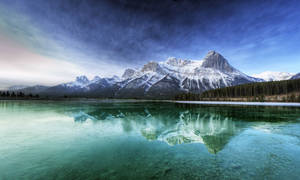 Enjoy The Beauty Of The Rocky Mountains Wallpaper