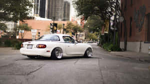 Enjoy The Drive In The Popular Mazda Miata Two-seater Convertible Wallpaper