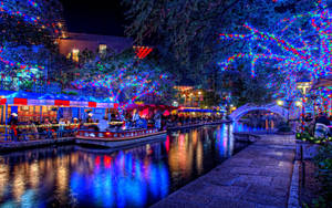 Enjoy The Enchantment And Holidays With A River Walk Wallpaper