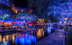 Enjoy The Enchantment And Holidays With A River Walk Wallpaper