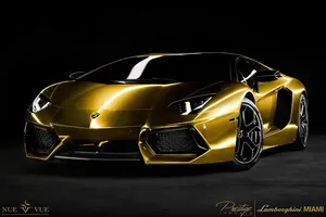 Enjoy The Luxury Of A Gold Car Wallpaper