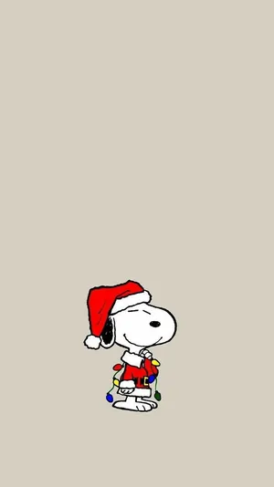 Enjoy The Magical Season Of Christmas With Snoopy Wallpaper