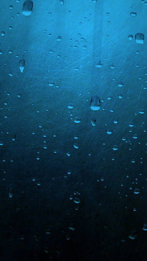 Enjoy The Peace And Serenity Of The Rain With Your Iphone Wallpaper