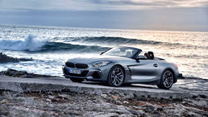 Enjoy The Power Of Bmw In Your Hands Wallpaper