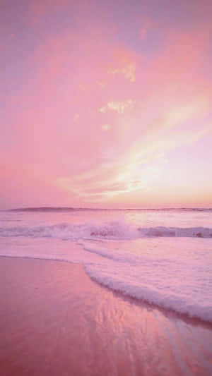 Enjoy The Serene Beauty Of Pink Beach Aesthetic Wallpaper
