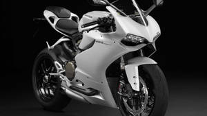 Enjoy The Speed And Style Of The Ducati 1199 Panigale In Arctic White Wallpaper