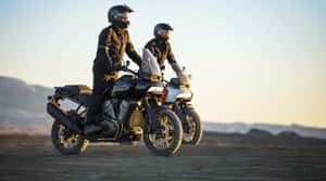 Enjoy The Thrill And Freedom Of Motorcycling Wallpaper