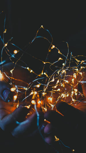 Enjoy The Twinkling Of Fairy Lights To Create A Magical Aesthetic Wallpaper