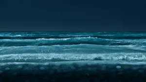 Enjoy The View From The Beach And Explore The Horizon With A 4k Ipad Wallpaper