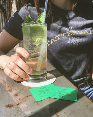 Enjoying A Refreshing Mojito At Tattersall Distilling Wallpaper