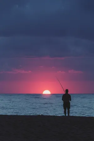 Enjoying A Summer Day At The Lake Fishing Wallpaper