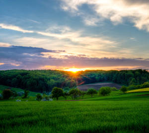 Enjoying A Warm Sunset In Plains Wallpaper