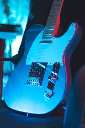 Enjoying My Neon Light Electric Guitar Wallpaper