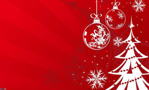 Enjoying The Magic Of Christmas With A Beautiful Snowscape Wallpaper