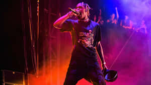 Enjoying The Travis Scott Concert In Style Wallpaper