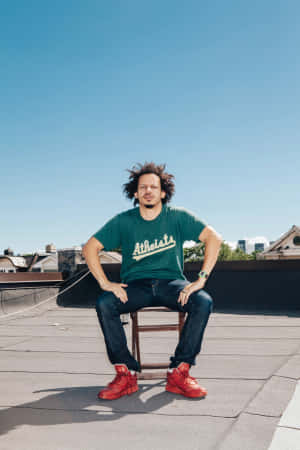 Eric Andre Rooftop Sitting Wallpaper