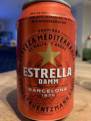 Estrella Damm In A Scarlet Red Can Wallpaper