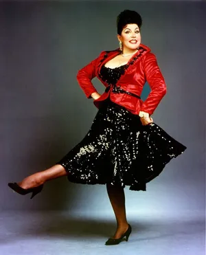 Ethel Merman Dancing In A Black And Red Outfit Wallpaper