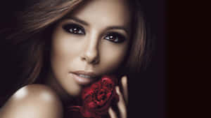 Eva Longoria Looking Stunning In An Elegant Pose Wallpaper