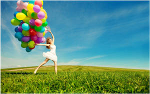 Excited Girl In A Field Wallpaper