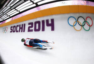 Exciting Fisheye Shot Of Luge Competition At Sochi 2014 Wallpaper