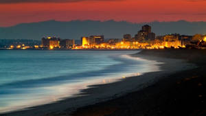 Experience The Night Lights Of Kusadasi, Turkey Wallpaper