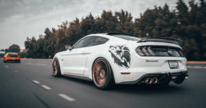 Experience The Power And Prestige Of Owning A Classic Mustang! Wallpaper