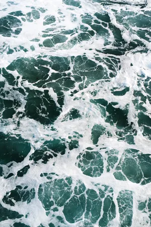 Experience The Serenity Of Blue Water Streams Wallpaper