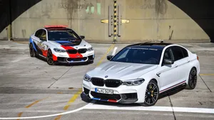 Experience The Thrill Of Driving A Bmw M5 Wallpaper
