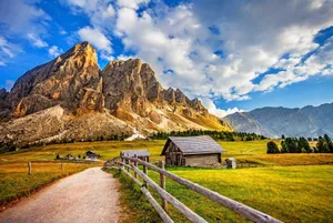 Explore The Beauty Of A Majestic Mountain Scape Wallpaper