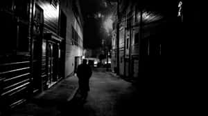 Exploring A Mysterious Alleyway In The City Wallpaper