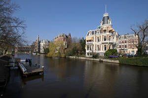 Exploring Amsterdam Canal Wallpaper