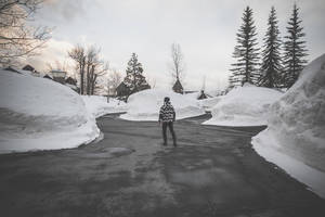 Exploring The Snow-filled Pathways Of Winter Wallpaper