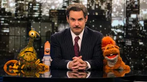 Expressive Paul F. Tompkins Gesturing In Episode Of