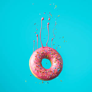 Falling Pink Donut Wallpaper