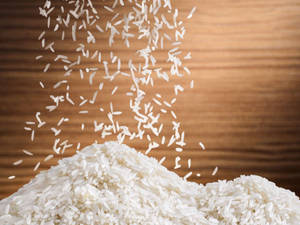 Falling Rice Into A Mound Wallpaper