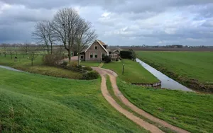 Farmhouse Beside An Irrigation Canal Wallpaper