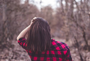 Fashion Forward - Woman In Checkered Polo Shirt Wallpaper