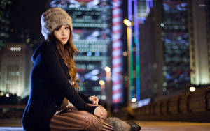 Fashionable Tokyo Japan Girl At Night Wallpaper