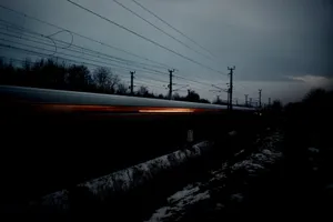 Fast Train Speeding Through The Night Wallpaper