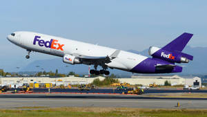 Fedex Tracking Airplane Taking Off Wallpaper