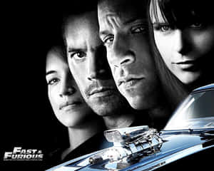 Feel The Adrenalin With The Cool Fast And Furious Cast Wallpaper