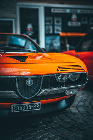 Feel The Power Of An Italian Legend In The Alfa Romeo Montreal Wallpaper