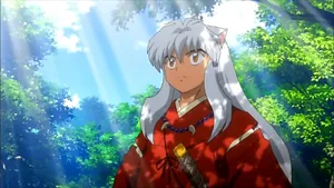 Feel The Power Of Time As Inuyasha Fights Alongside Kagome And His Friends! Wallpaper