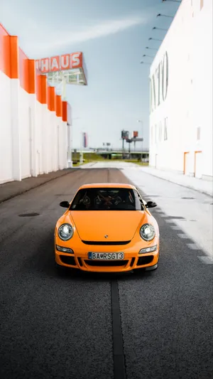 Feel The Speed With Porsche Iphone Wallpaper Wallpaper