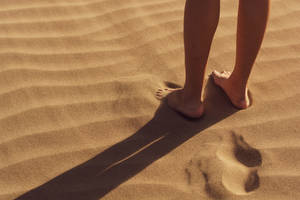 Feet On Fine Sand Dunes Wallpaper