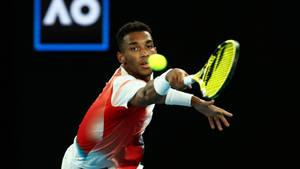 Felix Auger Aliassime Awesome Backhand Stroke Wallpaper