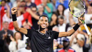 Felix Auger-aliassime Celebrating A Victory Wallpaper