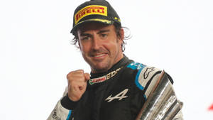 Fernando Alonso Celebrating Victory In Formula 1 Race Wallpaper